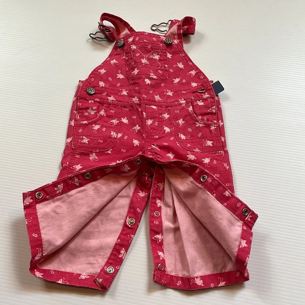 Oshkosh B’gosh pink bib overalls with butterflies, size 6 months